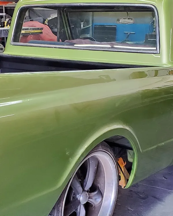 Classic Chevrolet C10 truck with fresh green paint at SV Collisions
