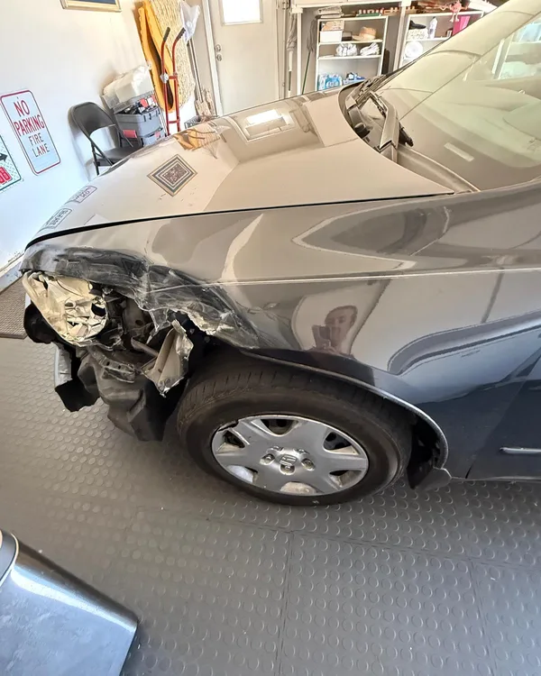 Front end collision damage on a vehicle at SV Collisions, El Cajon